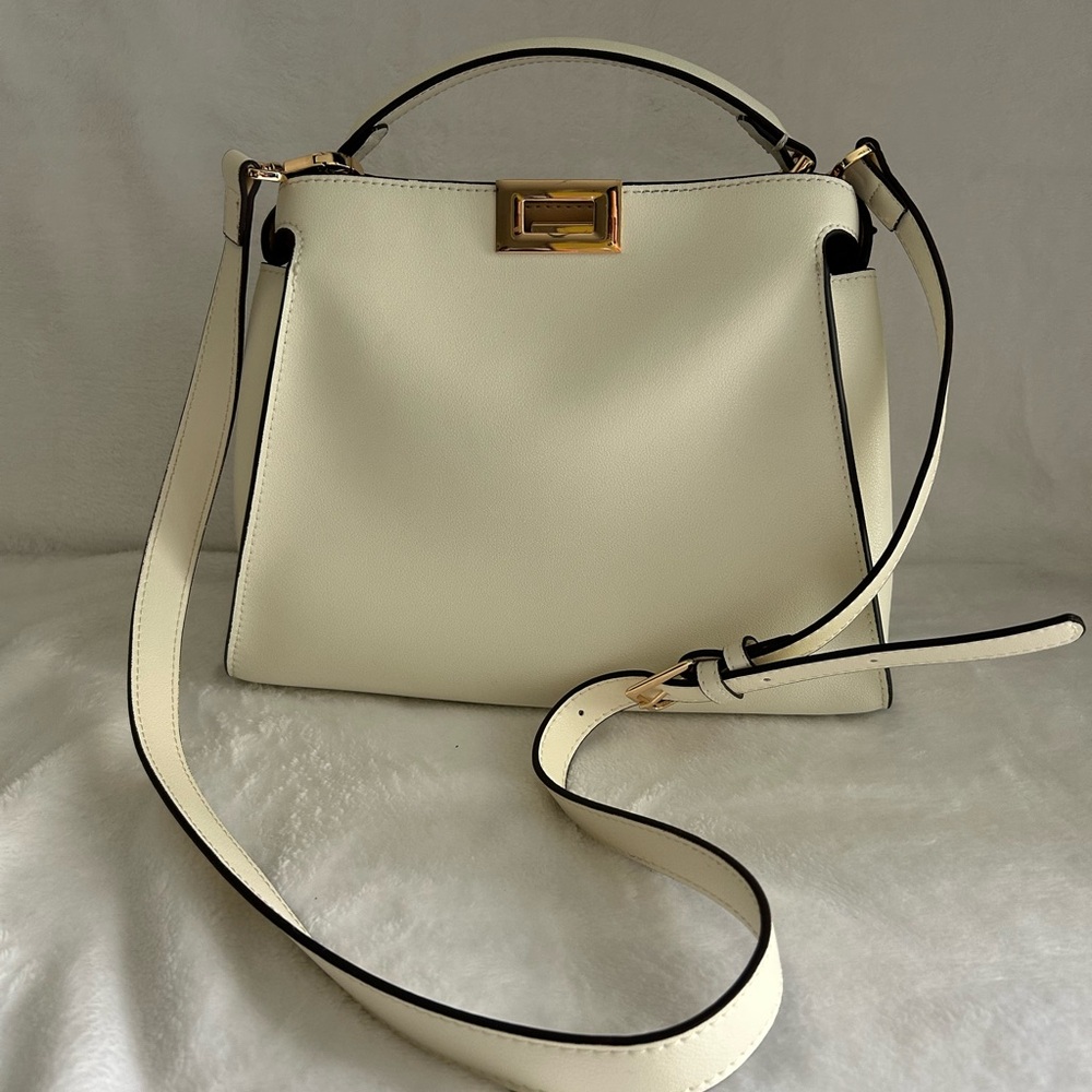 Ivory leather small “peekaboo” handbag.